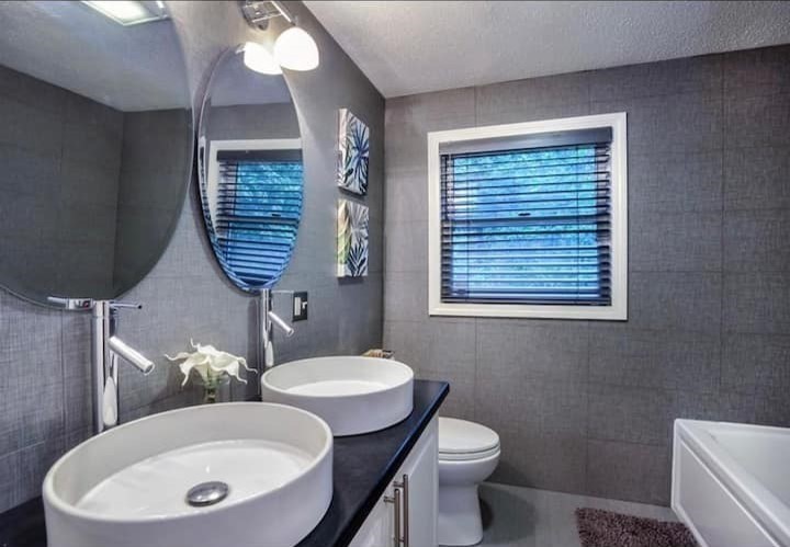 749 Worcester Street Wellesley, MA 02481 - Photo 10 of 17 a bathroom with a toilet a sink and mirror