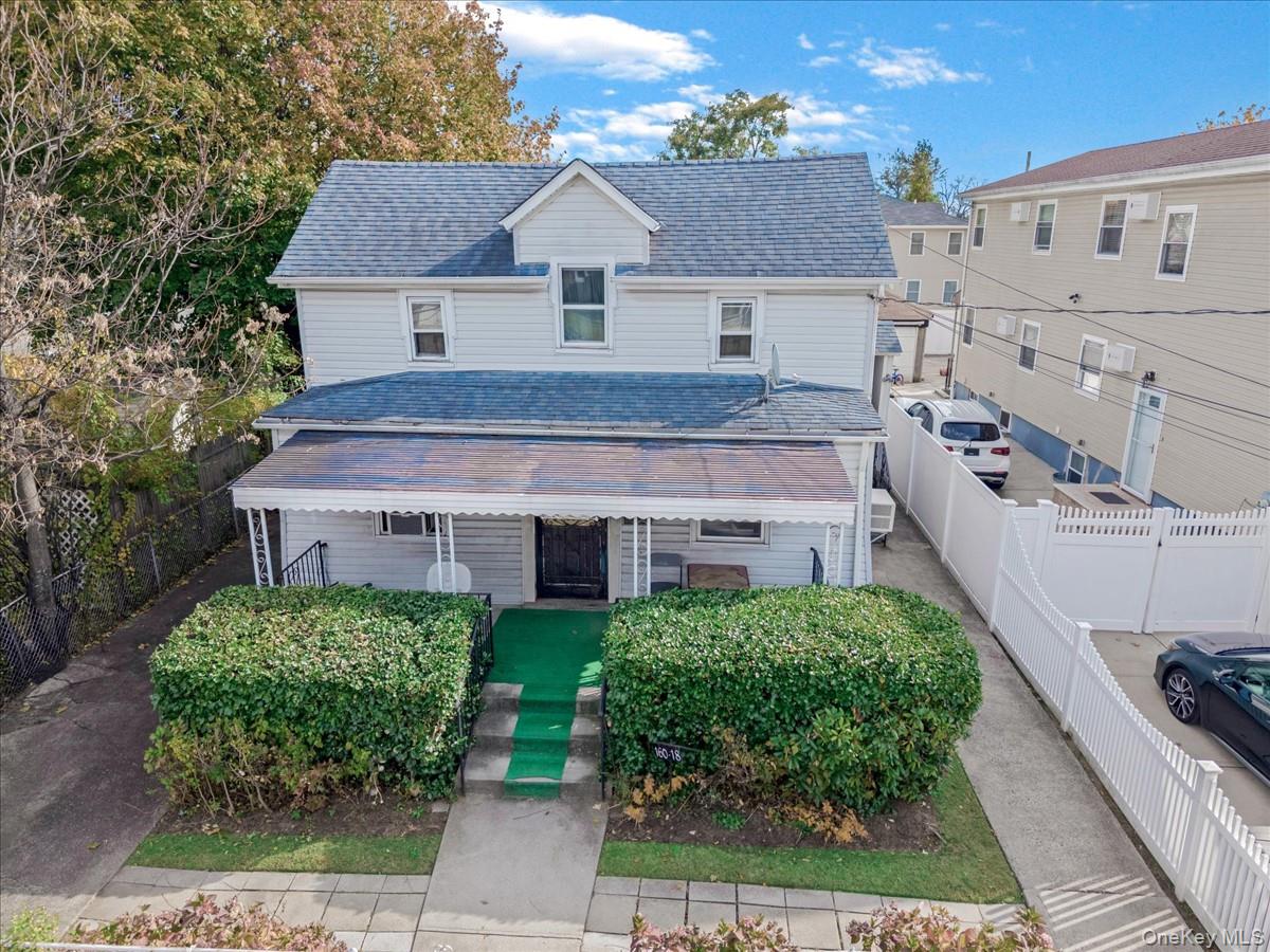 160-18 128th Avenue Queens, NY 11434 - Photo 1 of 5 a house that has a lot of plants in it