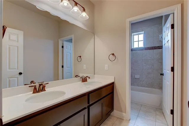 a view of backyard with large trees and wooden fence