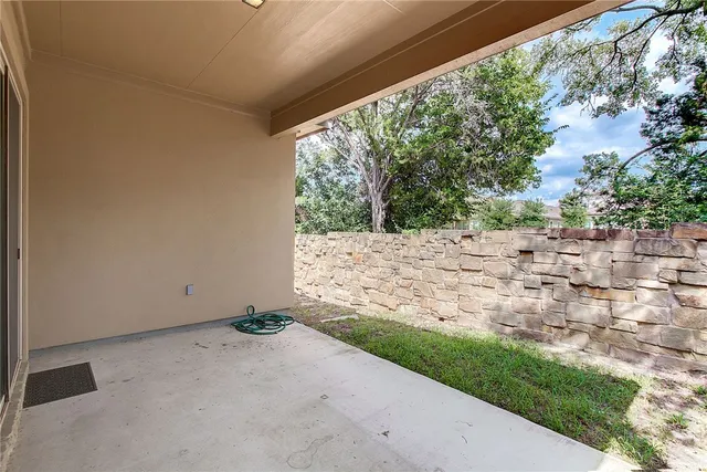 a view of backyard with green space