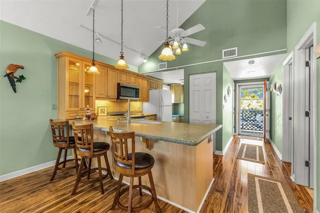 a picture of a bench in front of a building