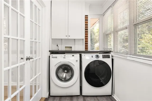 a utility room with dryer and washer