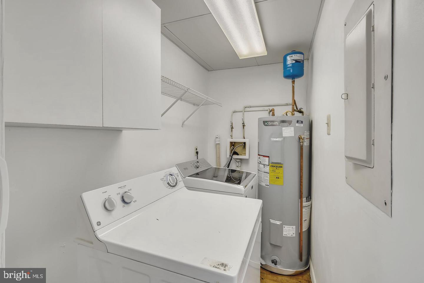 11 Hillside Road Greenbelt, MD 20770 - Photo 22 of 47 a utility room with dryer and washer