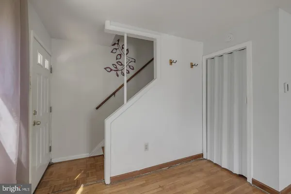 a view of a hallway with entryway