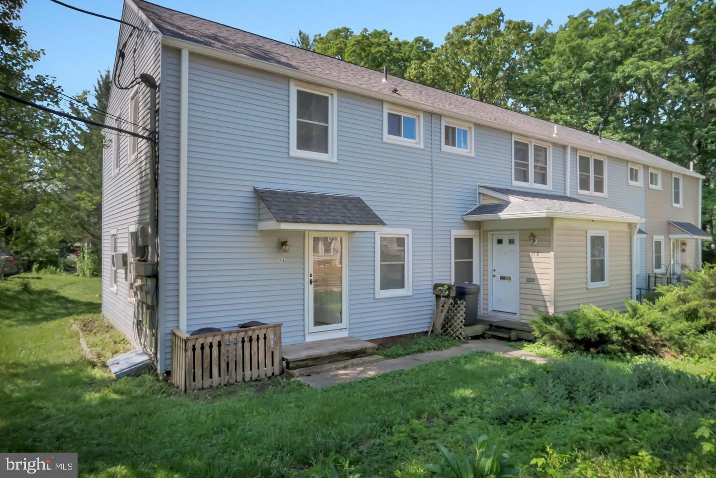 11 Hillside Road Greenbelt, MD 20770 - Photo 3 of 47 a front view of a house with garden