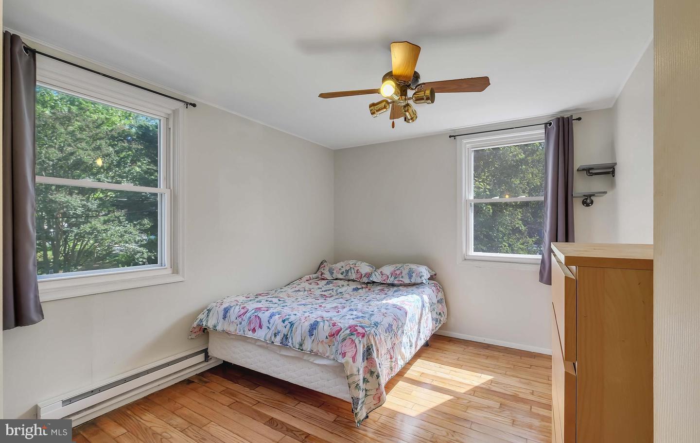 11 Hillside Road Greenbelt, MD 20770 - Photo 32 of 47 a bedroom with a bed and a window