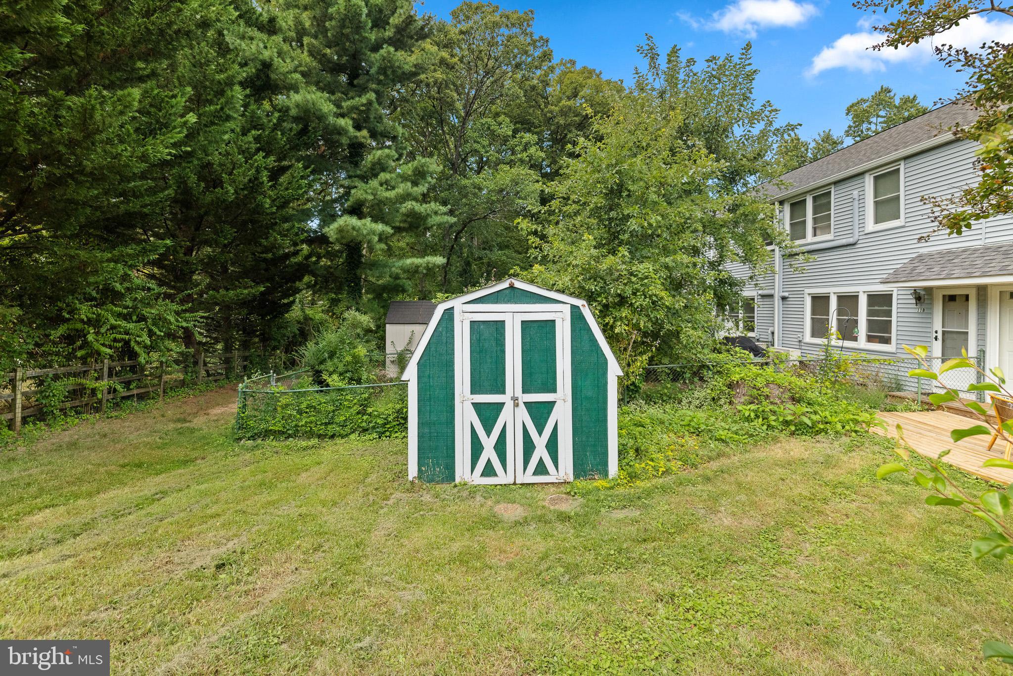 11 Hillside Road Greenbelt, MD 20770 - Photo 33 of 47 a house with trees in the background