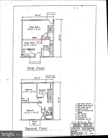 a utility room with a bed and a window