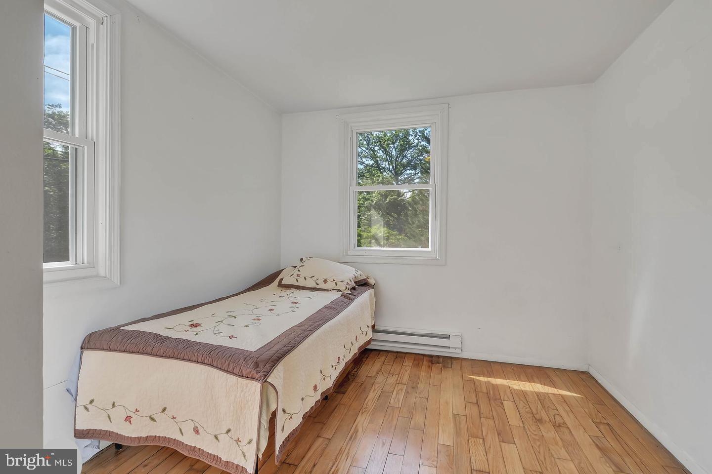 11 Hillside Road Greenbelt, MD 20770 - Photo 40 of 47 a utility room with a bed and a window