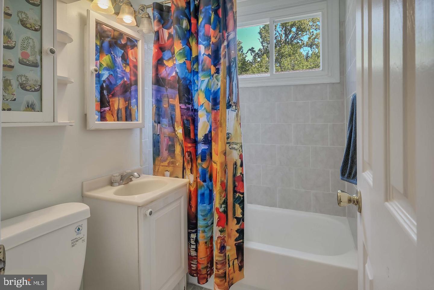 11 Hillside Road Greenbelt, MD 20770 - Photo 42 of 47 a bathroom with a sink and a bath tub