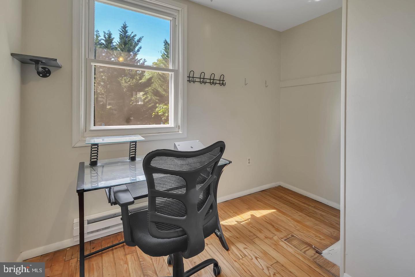 11 Hillside Road Greenbelt, MD 20770 - Photo 44 of 47 a workspace room with furniture and wooden floor