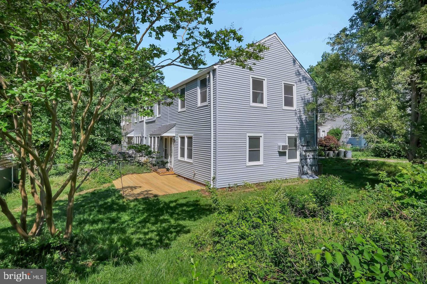11 Hillside Road Greenbelt, MD 20770 - Photo 10 of 47 a house view with a garden space