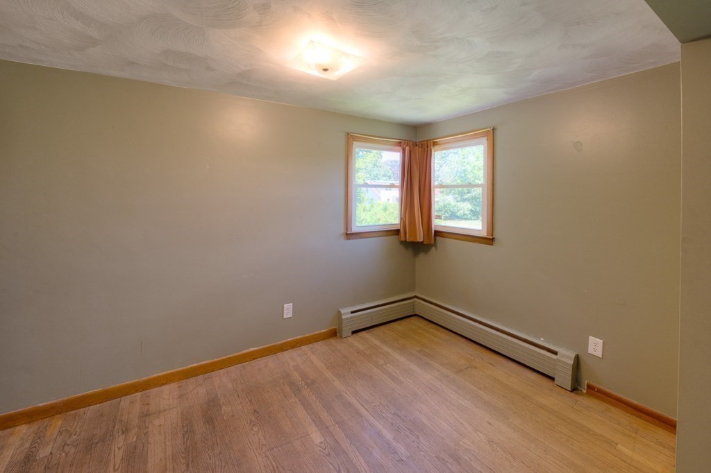 24 Edgewood Street Three Rivers, MA 01080 - Photo 13 of 37 an empty room with windows