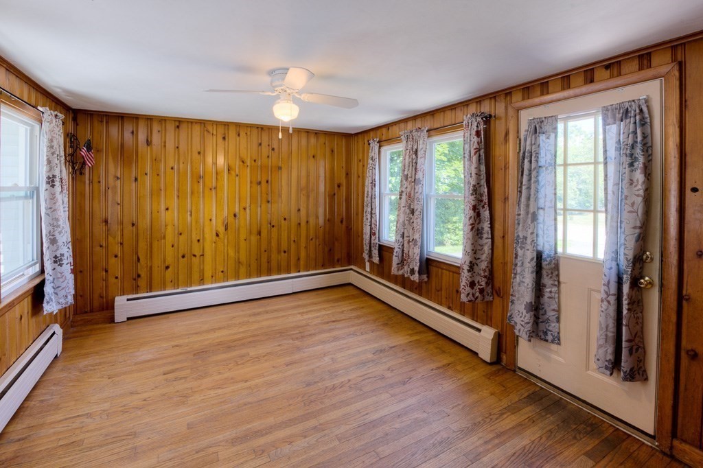 24 Edgewood Street Three Rivers, MA 01080 - Photo 19 of 37 a view of an empty room with wooden floor and a window