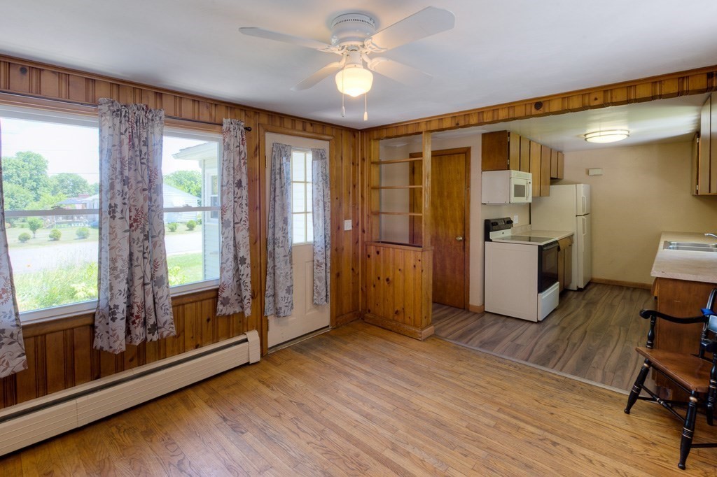 24 Edgewood Street Three Rivers, MA 01080 - Photo 21 of 37 a view of workspace with wooden floor and ceiling fan