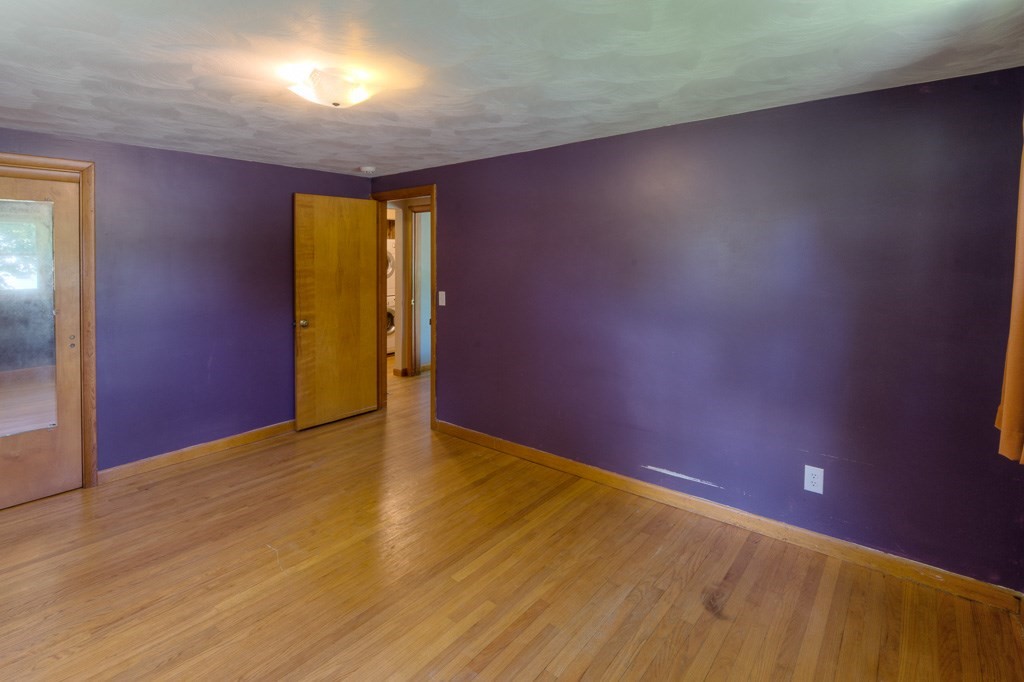 24 Edgewood Street Three Rivers, MA 01080 - Photo 23 of 37 an empty room with a empty space and windows