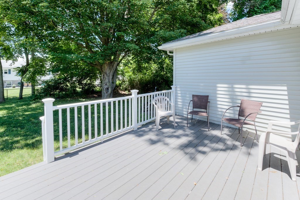 24 Edgewood Street Three Rivers, MA 01080 - Photo 34 of 37 a view of a wooden deck and a yard