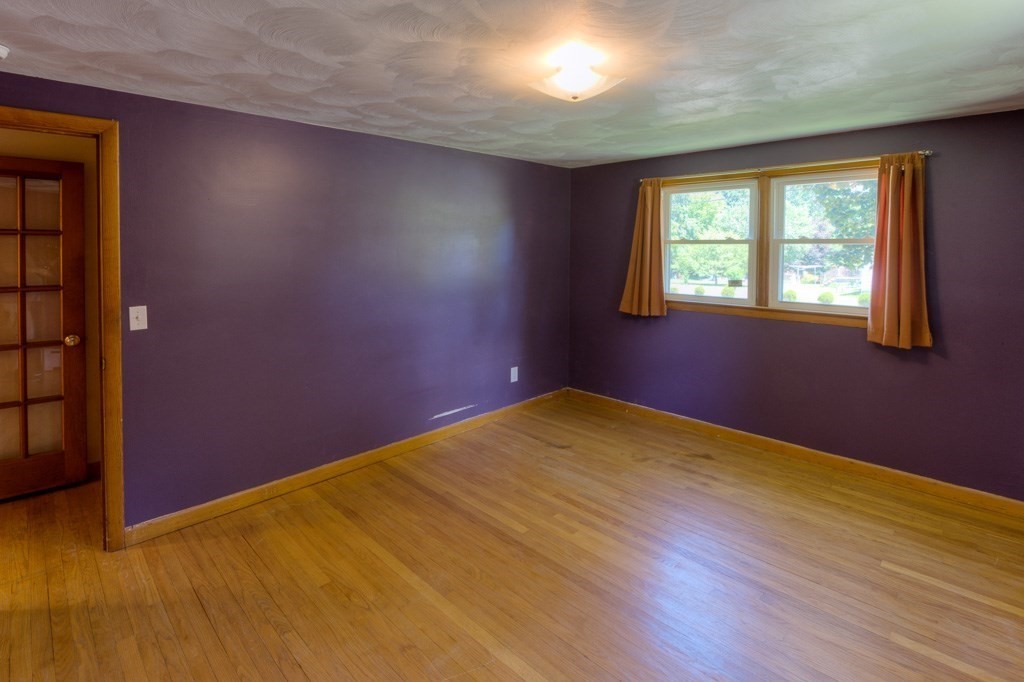 24 Edgewood Street Three Rivers, MA 01080 - Photo 7 of 37 an empty room with windows