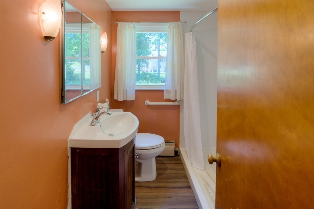 24 Edgewood Street Three Rivers, MA 01080 - Photo 8 of 37 a bathroom with a sink and a mirror