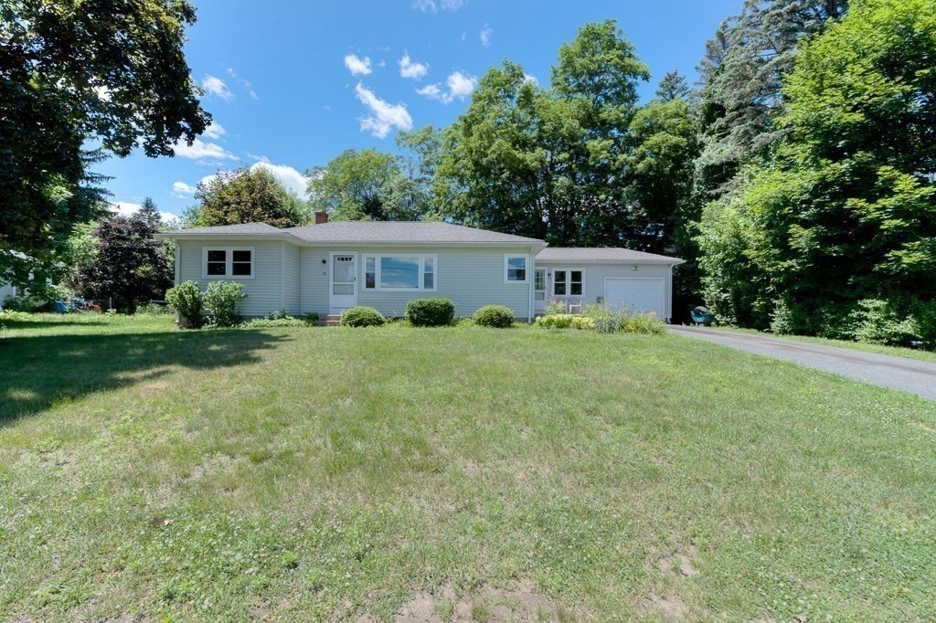 24 Edgewood Street Three Rivers, MA 01080 - Photo 10 of 37 a house with trees in front of it