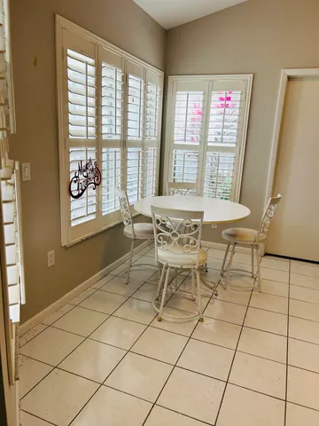 a bedroom with a bed and a cabinets