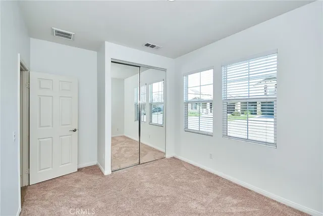 a view of an empty room with window