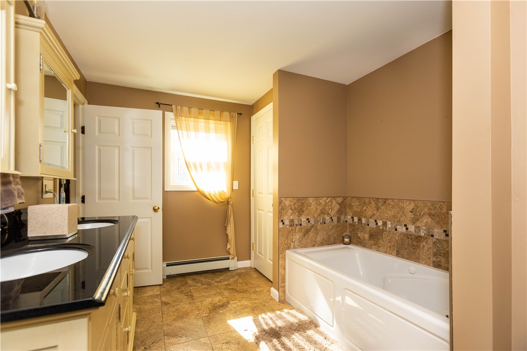 19 Silver Birch Road Warwick, RI 02888 - Photo 18 of 37 Newly added Master Bedroom Bath with soaking tub, tile floor