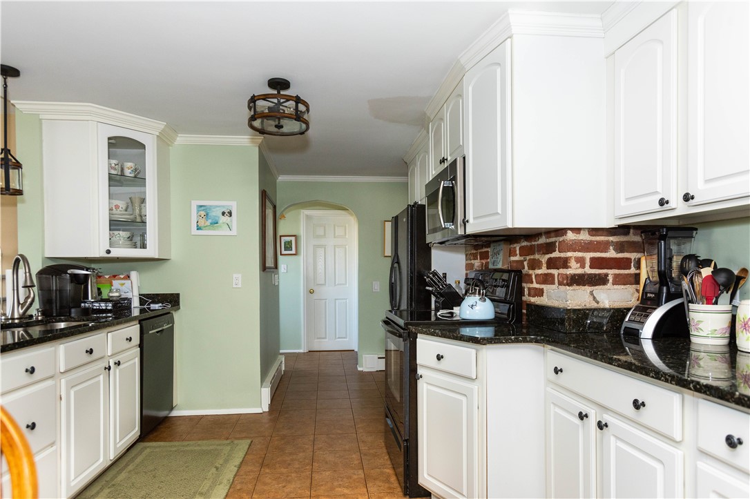 19 Silver Birch Road Warwick, RI 02888 - Photo 8 of 37 Updated Kitchen with tile floor, granete counters. Open to great Room.
