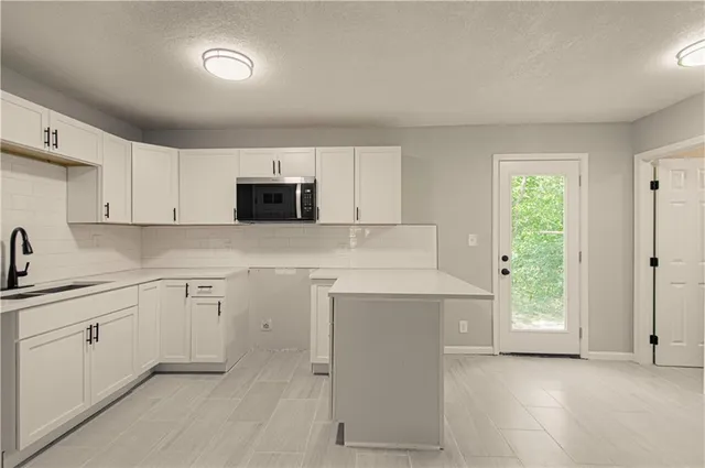 $179,900 | 11014 Cambridge Avenue, Kansas City, MO 64134