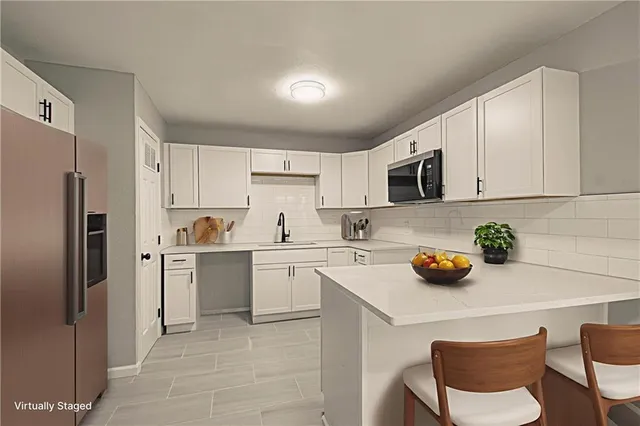 $179,900 | 11014 Cambridge Avenue, Kansas City, MO 64134