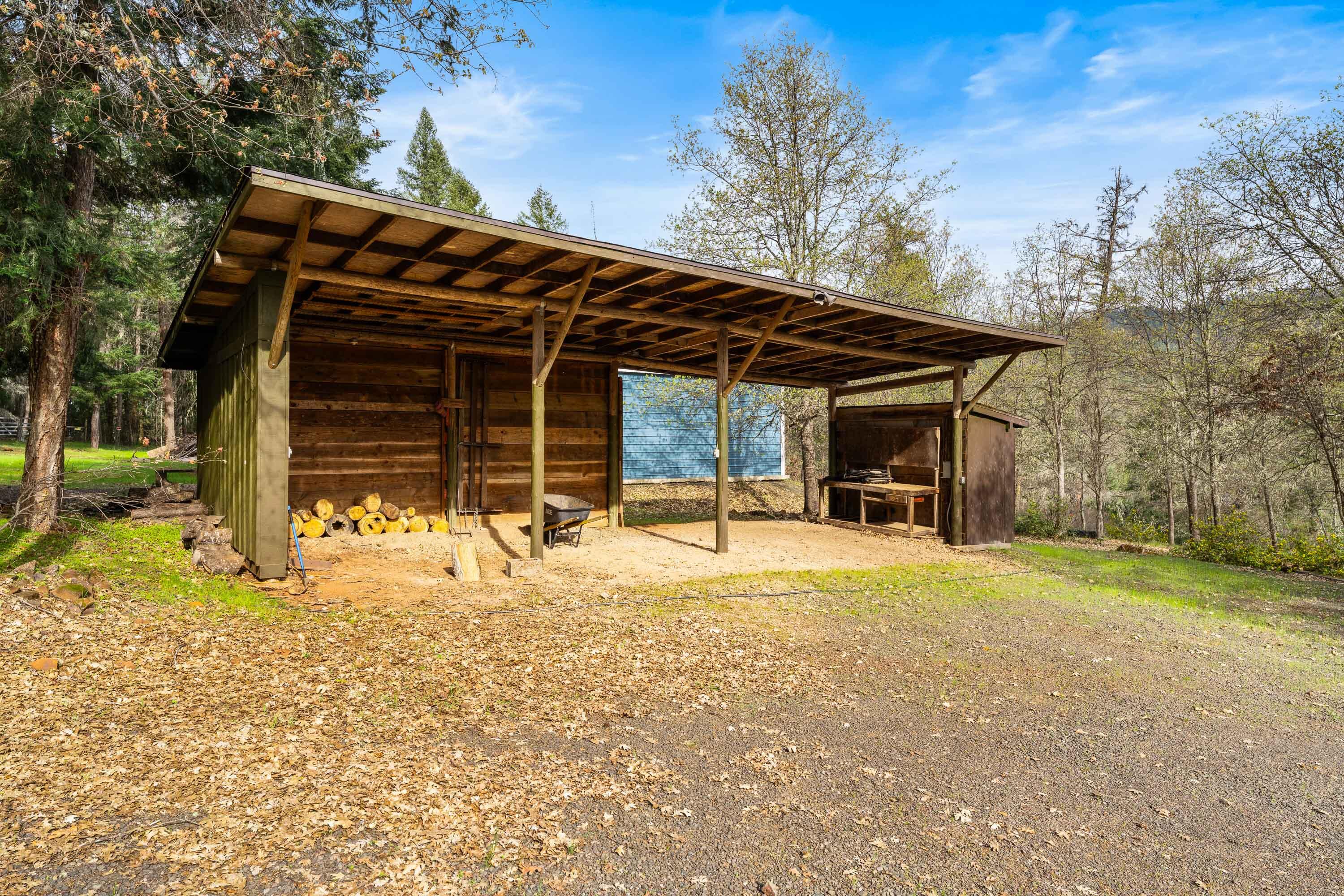 7201 Crowfoot Road Trail, OR 97541 - Photo 52 of 56 a front view of a house with a yard
