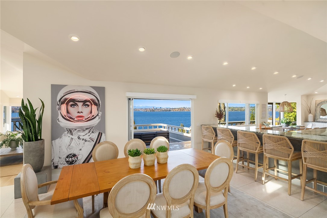 3223 Evergreen Point Road Medina, WA 98039 - Photo 11 of 36 a view of a dining room with furniture window and wooden floor