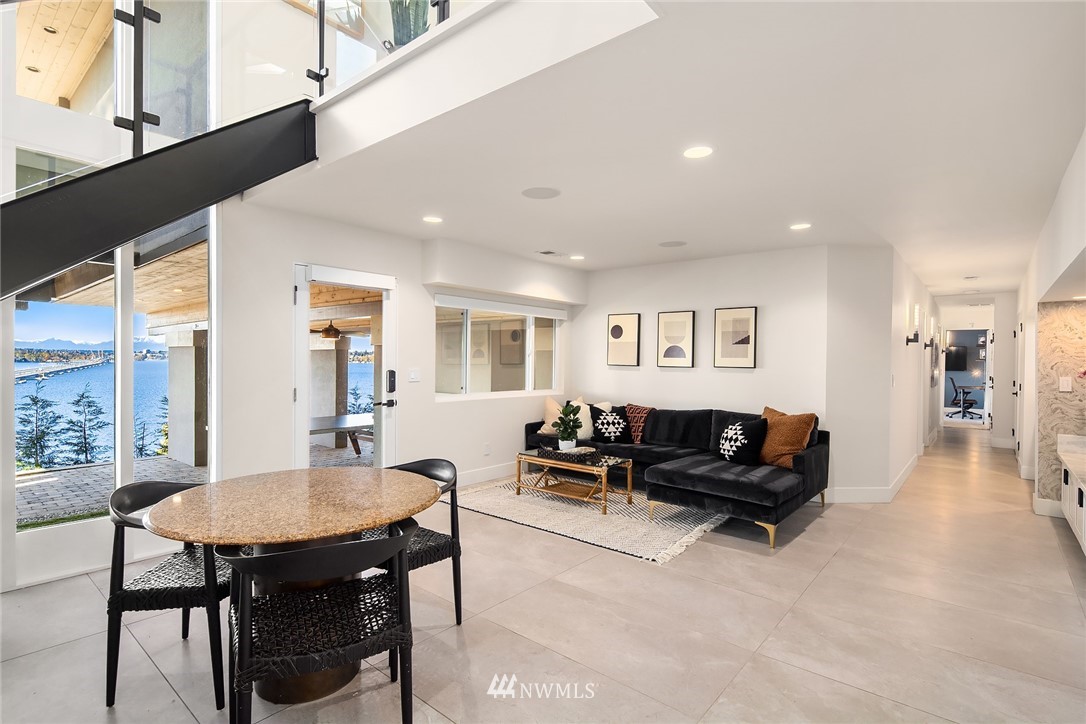 3223 Evergreen Point Road Medina, WA 98039 - Photo 21 of 36 a living room with furniture and a table