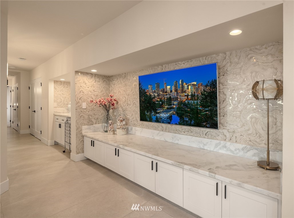 3223 Evergreen Point Road Medina, WA 98039 - Photo 22 of 36 a bathroom with a sink a vanity and a mirror