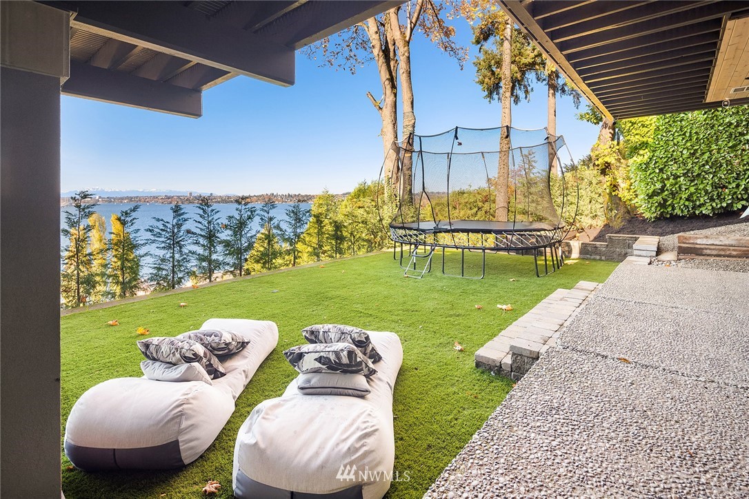 3223 Evergreen Point Road Medina, WA 98039 - Photo 29 of 36 a view of a two chairs in the patio