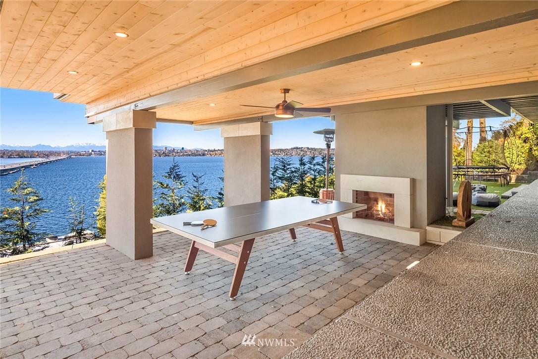 3223 Evergreen Point Road Medina, WA 98039 - Photo 30 of 36 a view of an chairs and tables in the patio