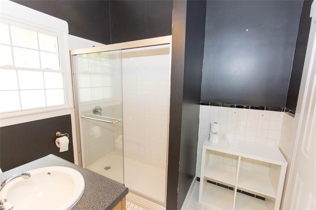 201 West 33rd Street, Unit A Austin, TX 78705 - Photo 6 of 20 a bathroom with a sink toilet and shower