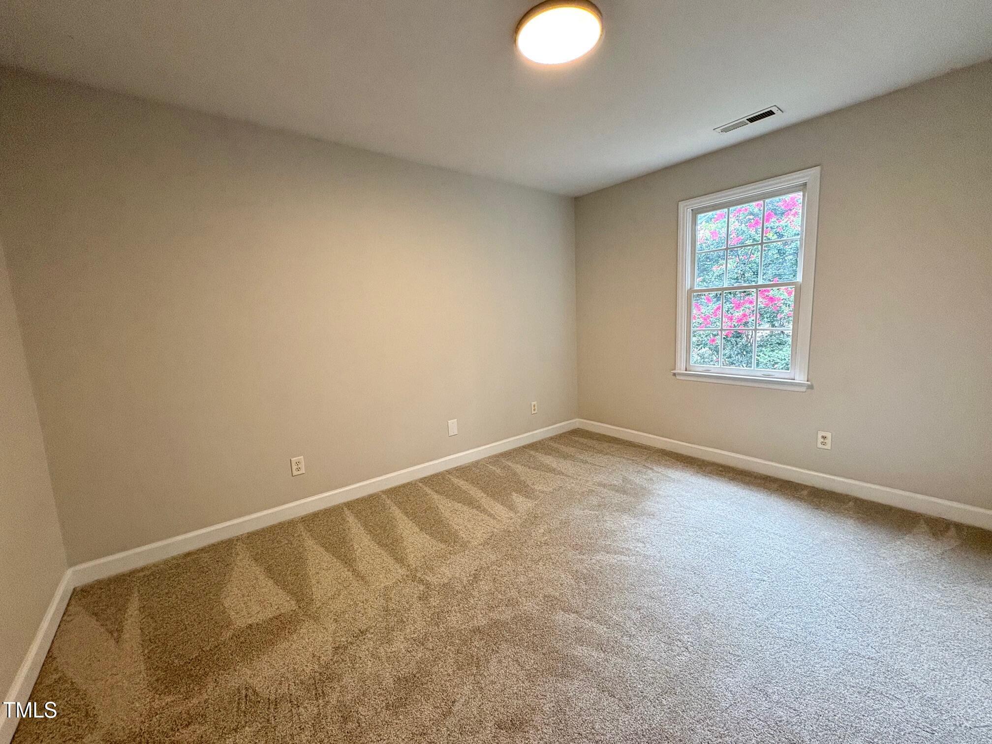 111 Gumdrop Path Apex, NC 27502 - Photo 11 of 17 a view of an empty room