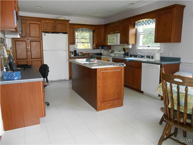 2572 Mountain Road Bath, PA 18014 - Photo 5 of 27 a kitchen with stainless steel appliances granite countertop a stove a sink a refrigerator and a refrigerator
