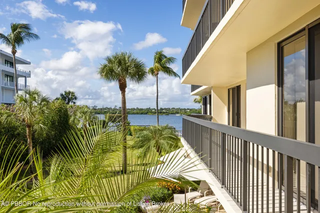 a view of balcony with furniture
