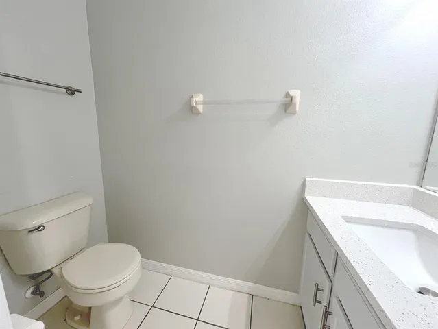a bathroom with a sink a toilet and a tub
