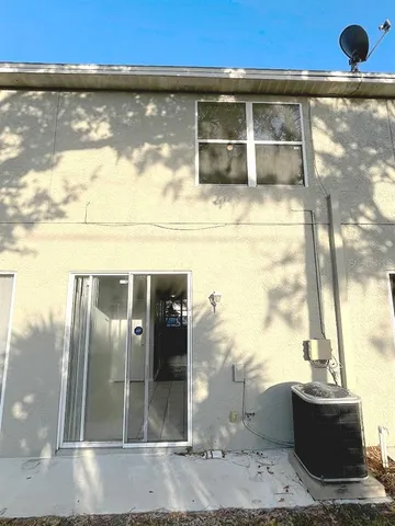 a view of back yard from a room