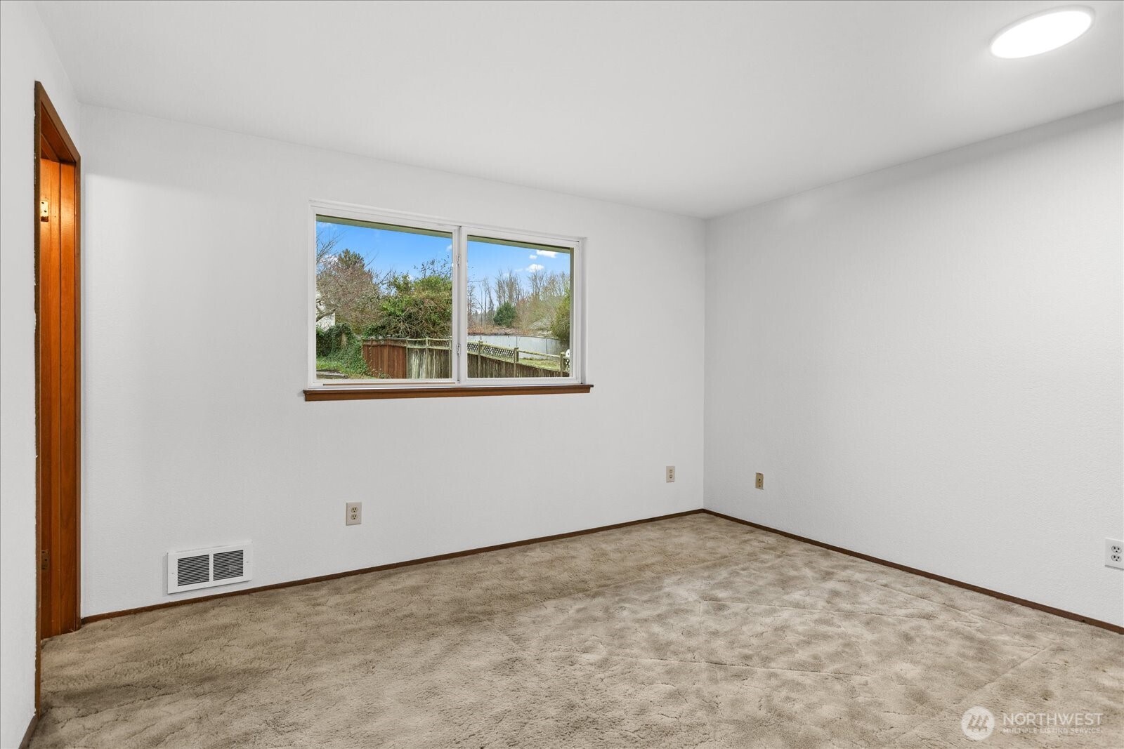 1403 234th Street Southwest Bothell, WA 98021 - Photo 14 of 37 an empty room with a window