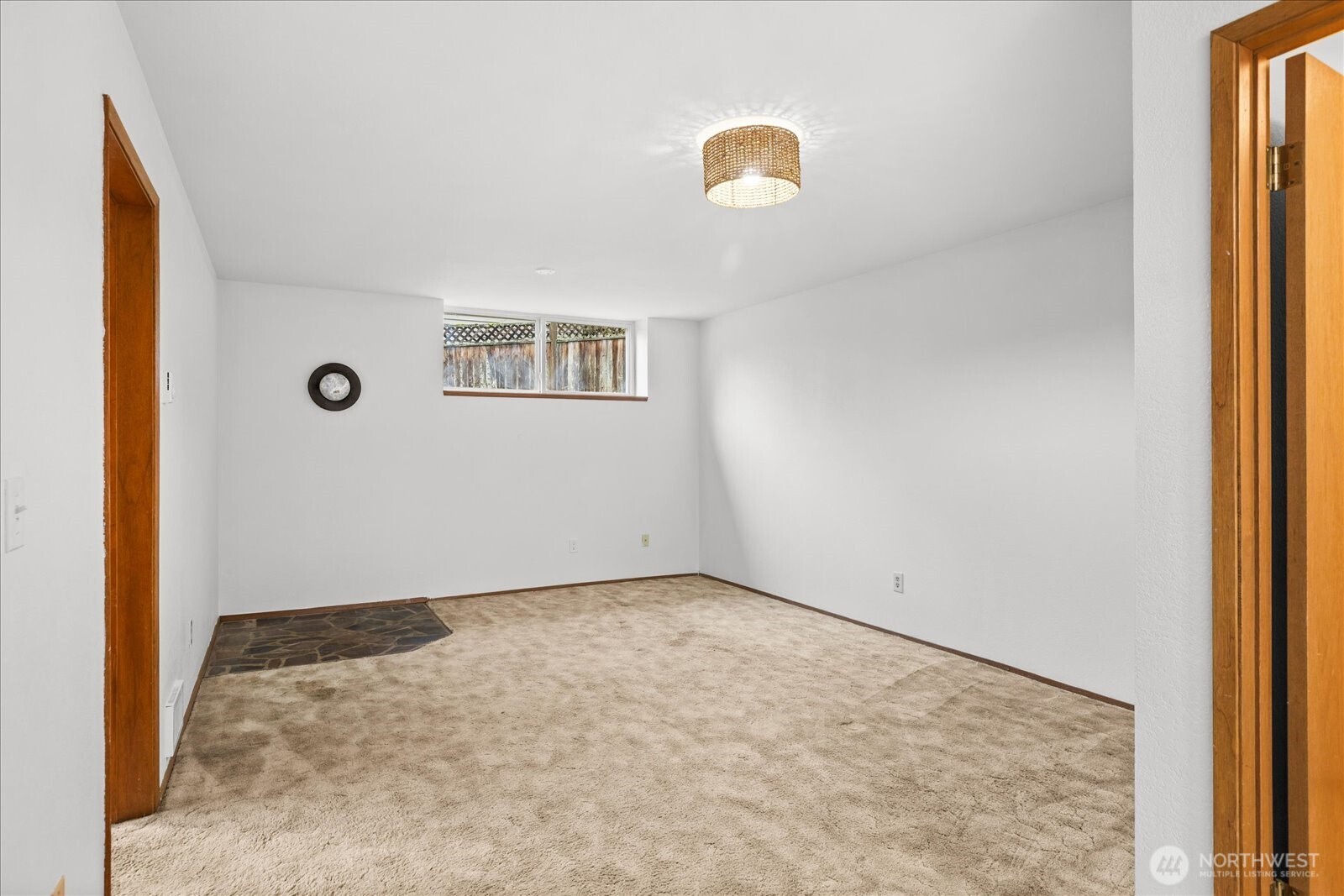 1403 234th Street Southwest Bothell, WA 98021 - Photo 22 of 37 an empty room with windows