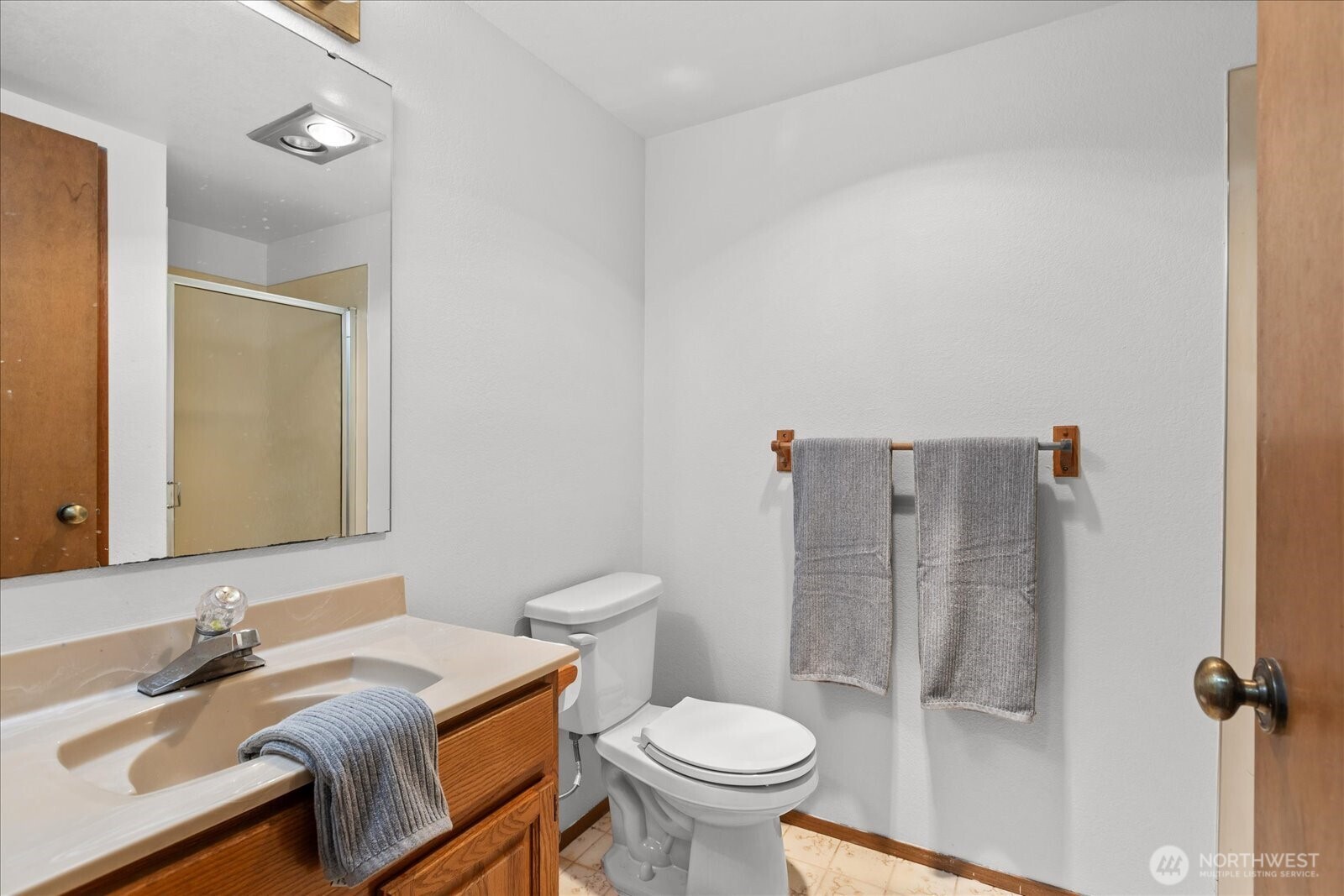 1403 234th Street Southwest Bothell, WA 98021 - Photo 27 of 37 a bathroom with a sink toilet and shower