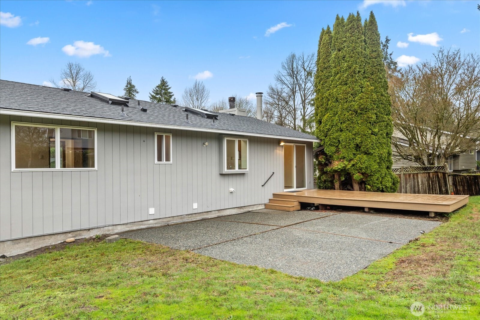 1403 234th Street Southwest Bothell, WA 98021 - Photo 29 of 37 a front view of a house with a garden