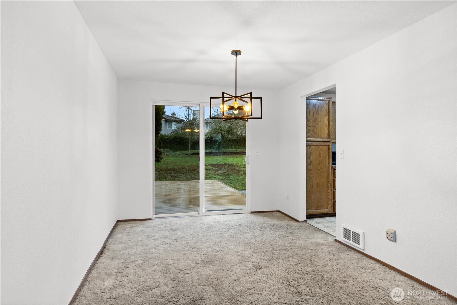 1403 234th Street Southwest Bothell, WA 98021 - Photo 7 of 37 a view of empty room with windows