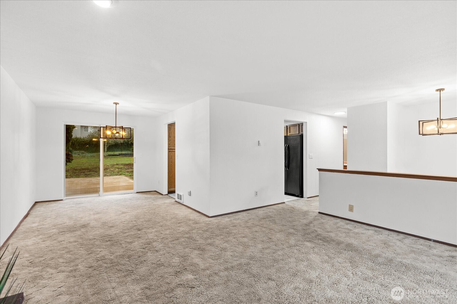 1403 234th Street Southwest Bothell, WA 98021 - Photo 8 of 37 a view of an empty room with a window