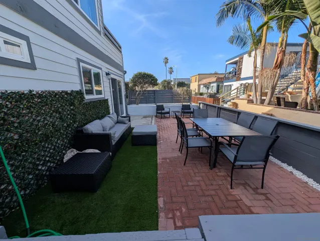 a view of a yard and patio