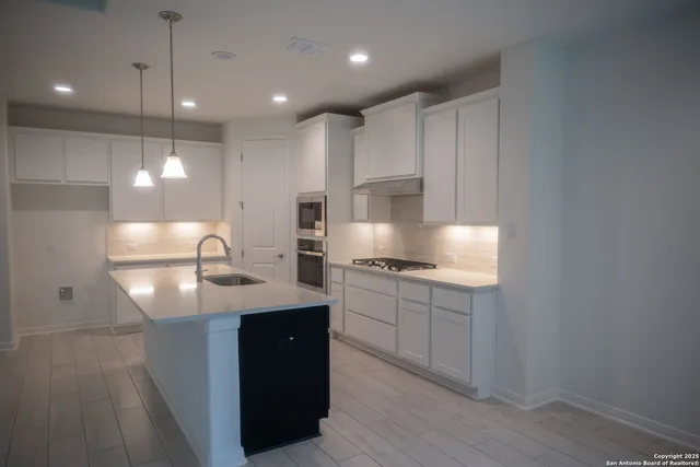 a view of a hallway with entryway